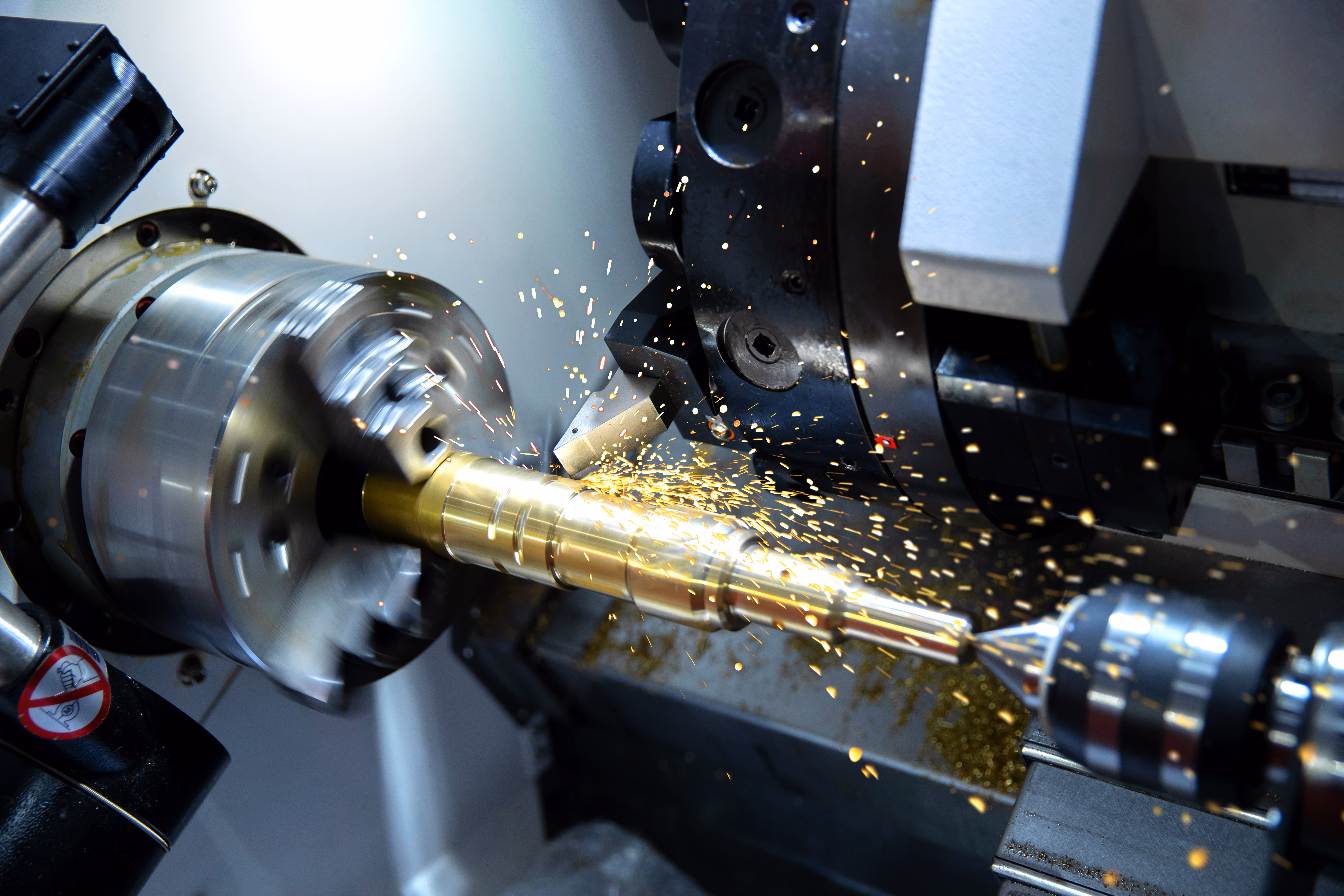CNC lathe machine operating at Titan Machining LLC workshop in Ajman, UAE